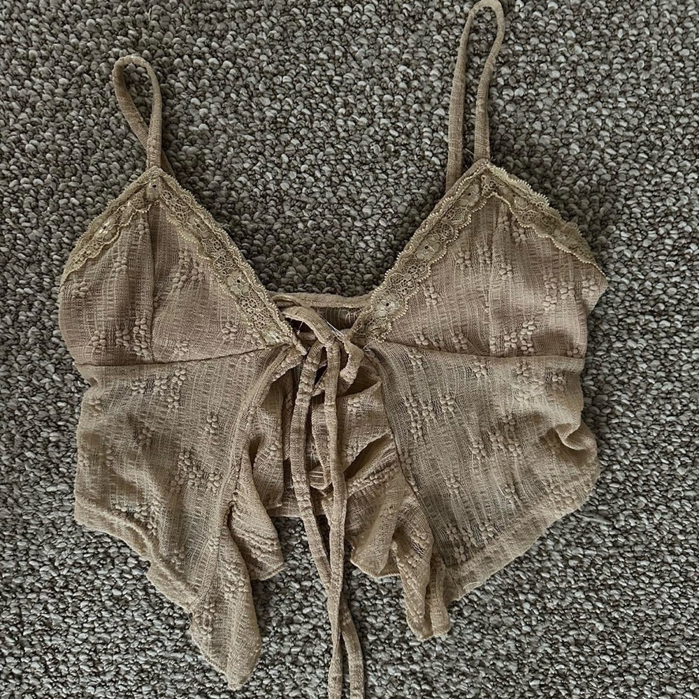 Light brown lace tank top that ties in the front (size medium but runs small)
